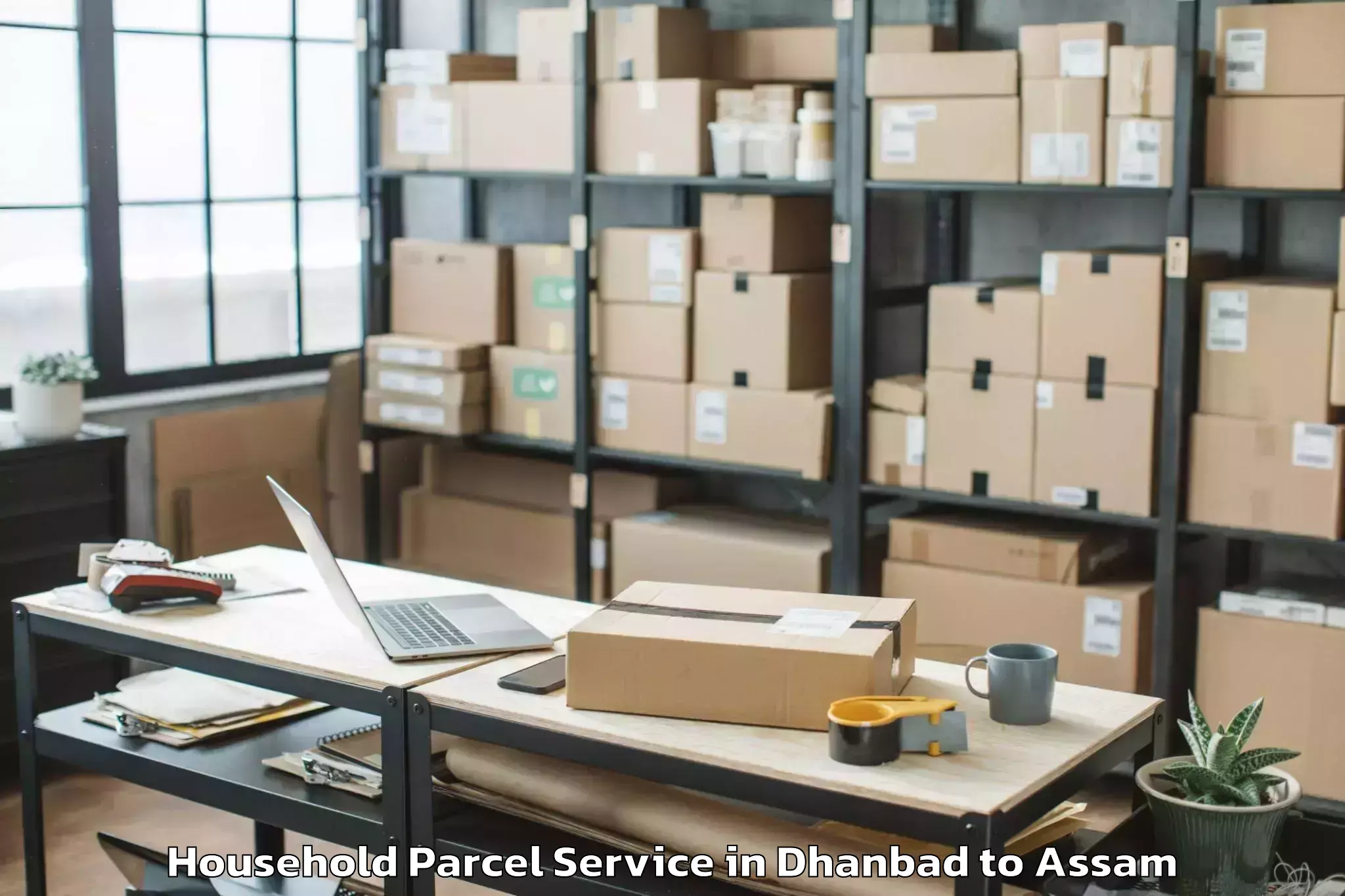 Dhanbad to Salonibari Airport Tez Household Parcel